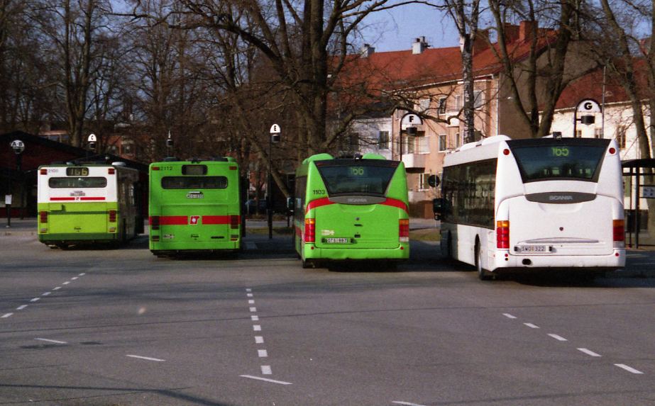 Several Nyköping city buses.
